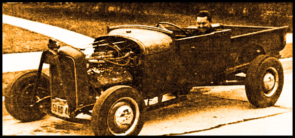 Here's young Larry Shinoda with his Flathead Ford street racer. Larry definitely had gasoline in his veins.